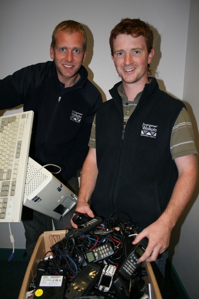 Environment Waikato sustainability champions Sam Stephens (left) and William Gauntlett sort through electronic waste ahead of eDay